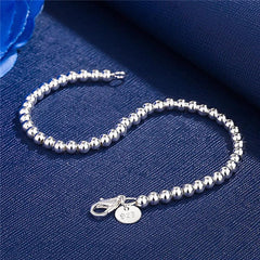 Elegant Silver Charm Bracelet: Stylish Accessory for Women's Fashion Parties