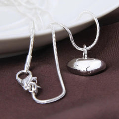 Sterling Silver Heart Pendant Necklace: Elegant Women's Jewelry Piece
