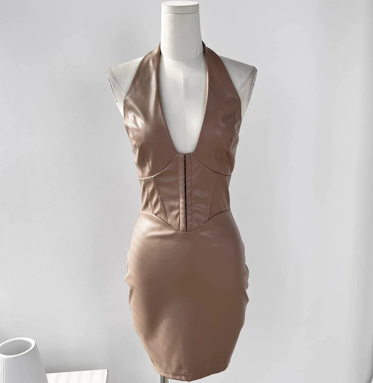 Seductive Deep V-neck PU Leather Dress: Versatile Fashion Statement