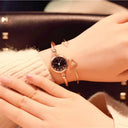 Gold Bangle Bracelet Watch for Women by YIKAZE: Retro Stainless Steel Quartz Wristwatch with Fashionable Design  ourlum.com   