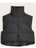 Winter Fashion: Down Coats and Sleeveless Vests Style