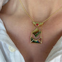 A Copper Envelope Necklace Inlaid With Red Hearts Design