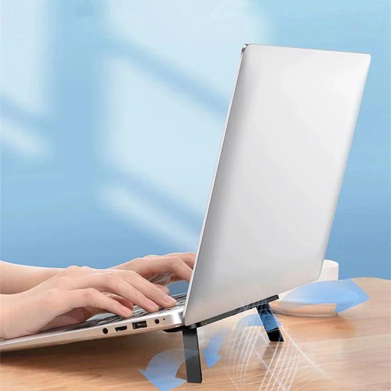 Laptop Riser Stand: Elevate Macbook with Invisible Cooling Pad  ourlum.com   