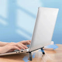 Laptop Riser Stand: Elevate Macbook with Invisible Cooling Pad  ourlum.com   