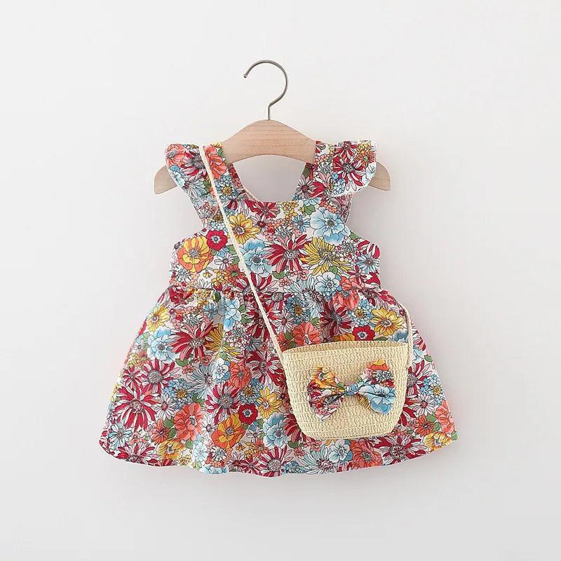 Enchanting Vintage Garden Baby Girl's Dress with Floral Accents and Matching Straw Bag  ourlum.com   