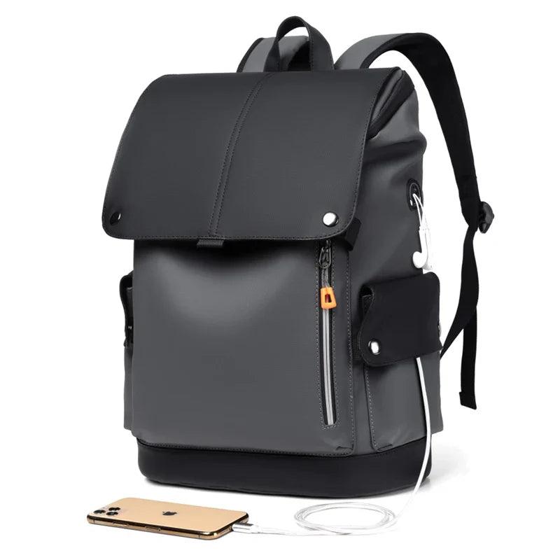 Waterproof PU Leather Laptop Backpack for Men with USB Charging - Stylish & Spacious Business Bag