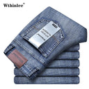 Classic Blue Stretch Denim Trousers for Men by WTHINLEE