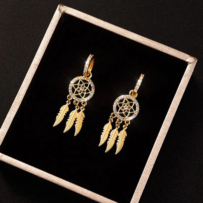 Feather Dangle Earrings: Elegant 14k Gold Jewelry with Zircon Stones for Women's Parties  ourlum.com   