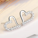 Starlight Elegance Silver Star Stud Earrings Dazzling Zircon Design