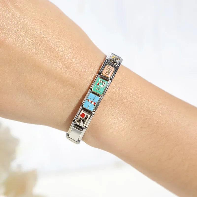 Enchanting Stainless Steel Bracelet with Animal Charm Motifs  ourlum.com   