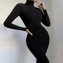 Sleek Black Turtleneck Jumpsuit Chic Winter Bodysuit Style