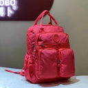 Fashion Woman Backpack Waterproof Nylon Soft Handle Solid Multi-pocket Travel Zipper Feminina School Bags Laptop Backpack  ourlum.com Rose  