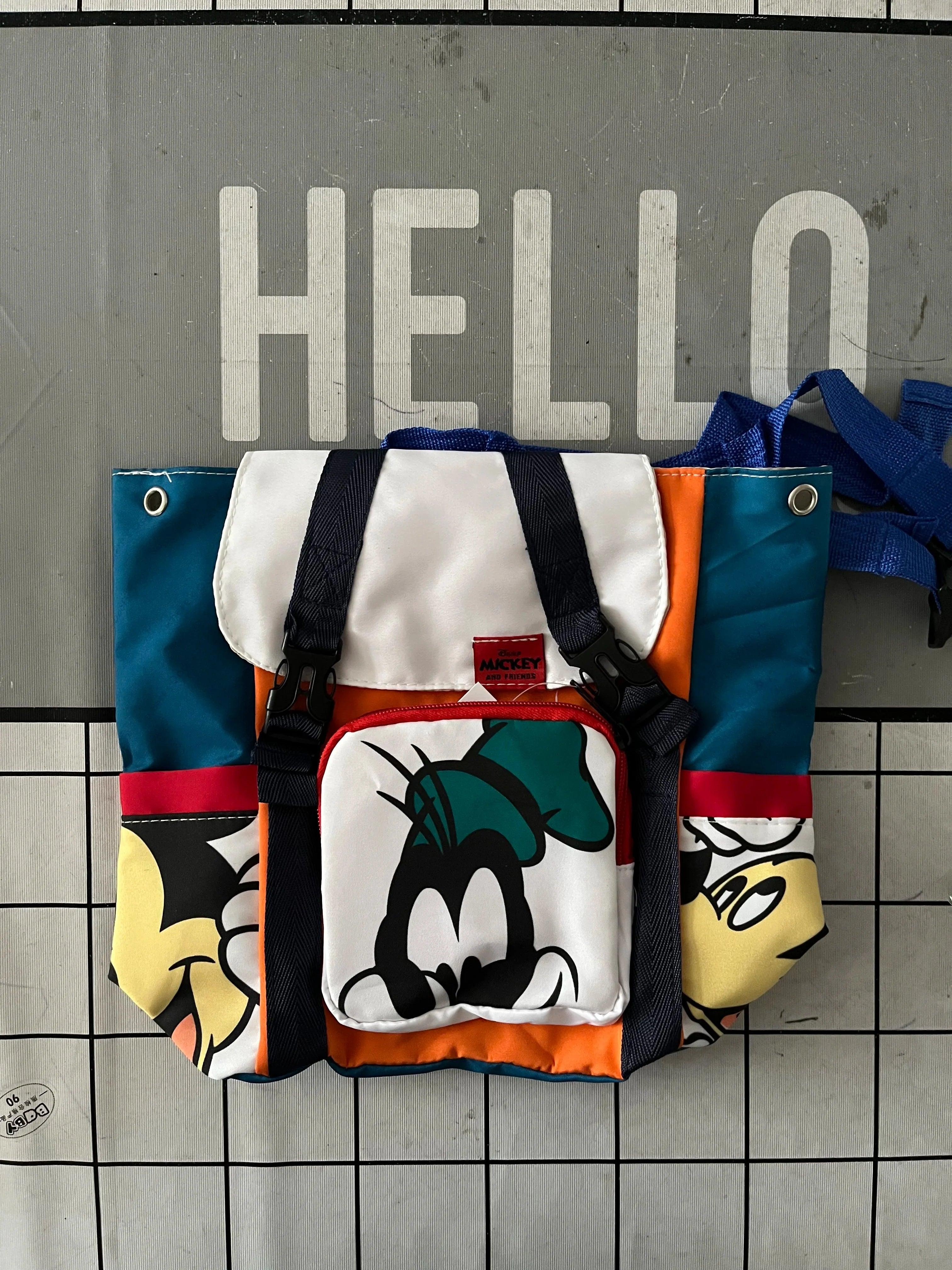 2023 New Children's Bag  Disney Donald Duck Mickey Mouse Cartoon Print Kids' Backpack Nylon Skin Contrasting Colors Schoolbags  ourlum.com   